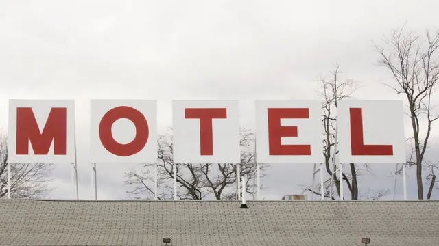 Roadside motel exterior and sign
